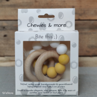 bijtring, rammelaar oker / wit